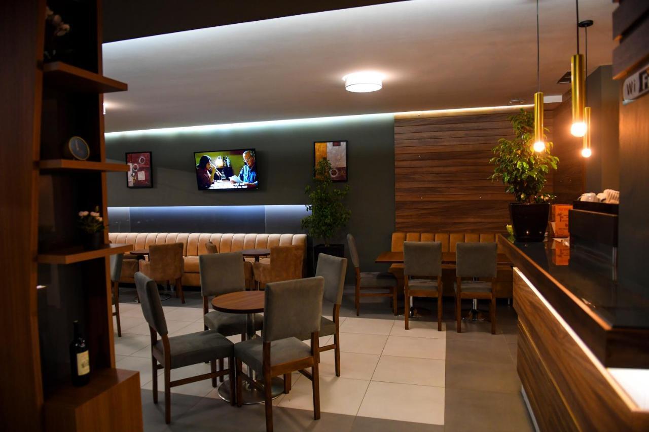 Santo Hotel *